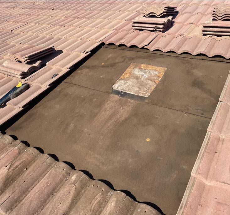 roof tile broken, being prepared to be repaired