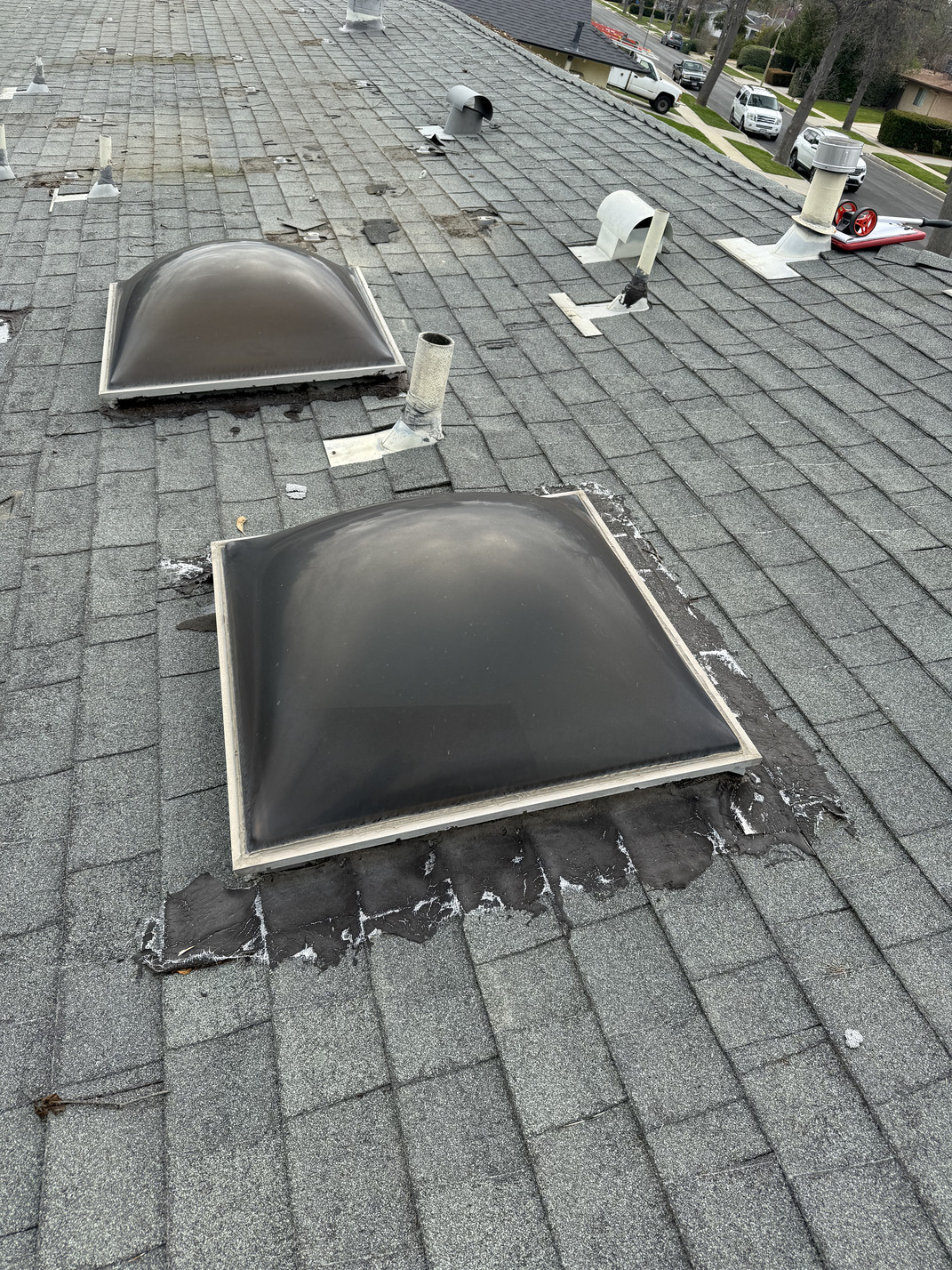 broken tile roof with a leak being repaired by the expert roofing company in hemet, ca